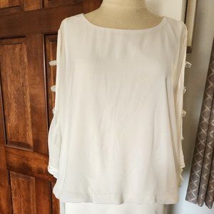 Brand new MSK cream top with flutter sleeve